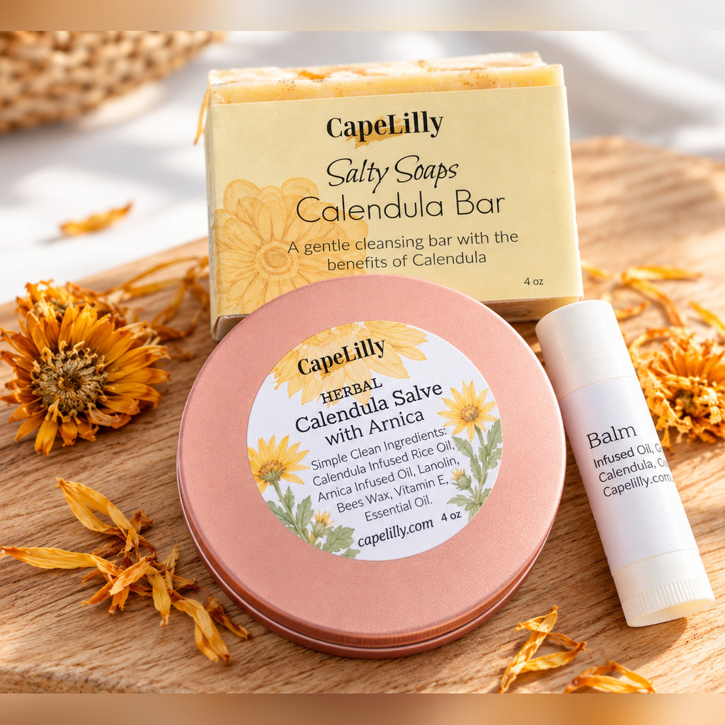 Calendula Gift Bundle: Calendula Sea Salt Soap, Calendula Salve and Calendula Lip Balm on a wooden board