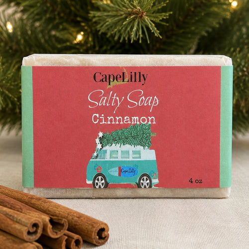 Cape Lilly Cinnamon sea salt soap in festive holiday van wrapper, 4 oz, with cinnamon sticks
