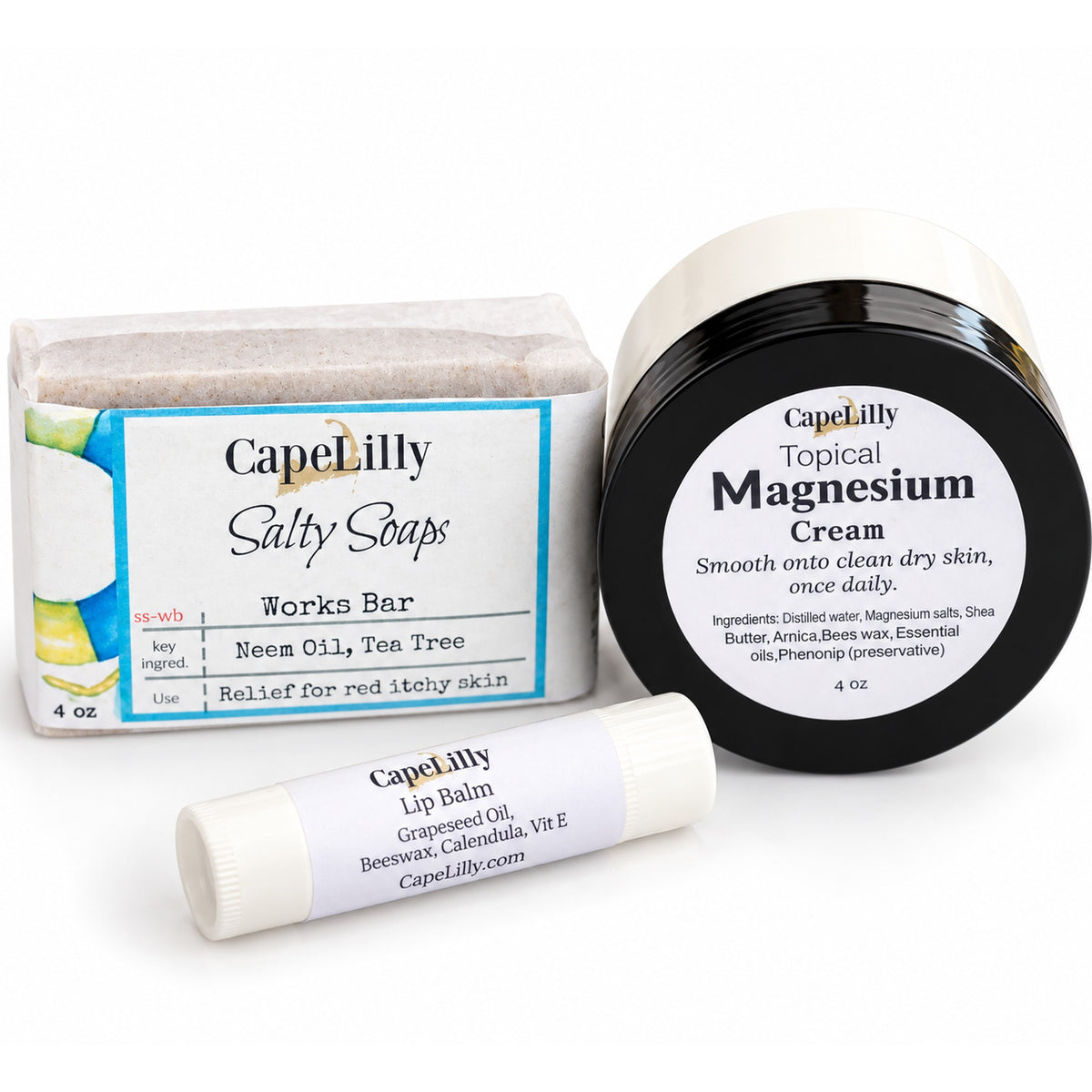 Fan Favorites Holiday Gift Bundle: Topical Magnesium Cream, The Works Bar and Calendula Lip Balm on white
